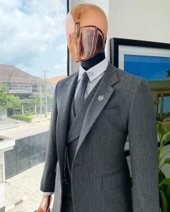 A Lava Grey, herringbone-patterned fabric Jorgecarli Super 140’s “Board Room” notch lapel suit