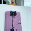 A lavender-purple invisible flap with an invisible pocket, paisley, and Swarovski button details African traditional senator Kaftan native