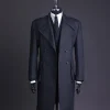 A Lead grey, double breasted, notch lapel trench coat with combat pocket.