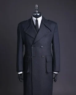 A Lead grey, double breasted, notch lapel trench coat with combat pocket.