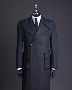 A Lead grey, double breasted, notch lapel trench coat with combat pocket.