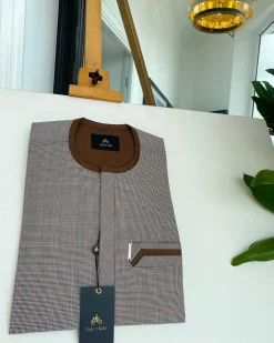 A Light and dark brown check, front flap and sliding pocket details African traditional kaftan native.