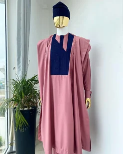 A light beige agbada with a navy blue uncoordinated lines embroidery design, Yoruba embroidery hat, kaftan and sokoto