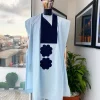 A Light blue, connected square navy blue embroidery Agbada