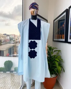 A Light blue, connected square navy blue embroidery Agbada