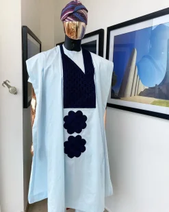 A Light blue, connected square navy blue embroidery Agbada