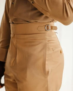 A Light brown Gurkha Pant With A Side Metal Adjuster.