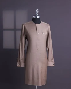 A Light brown, jorgecarli fabric, front flap with silver Swarovski button, long sleeve African senator kaftan native.