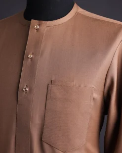 A Light brown, Nobility fabric, front flap, 3/4 sleeve and gold details Swarovski button African senator kaftan native.