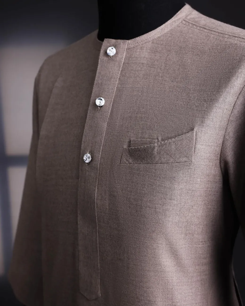 A Light cedar brown, Jorgecarli wool, front flap, layered suit & pen pocket, 3/4 sleeve and clear view silver Swarovski button African senator kaftan native.