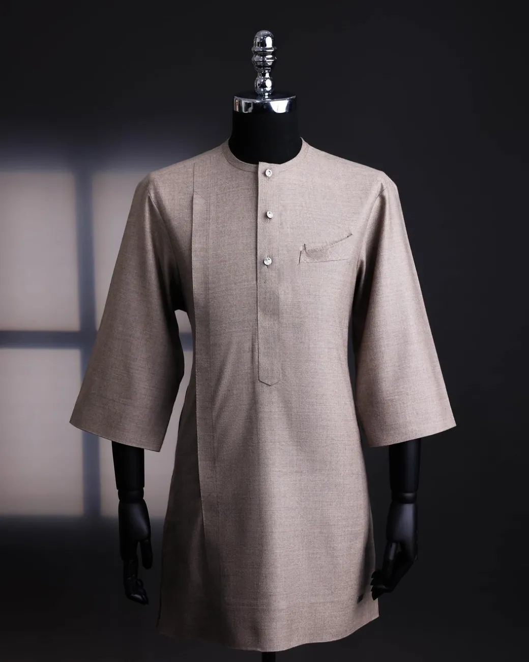 A Light cedar brown, Jorgecarli wool, front flap, layered suit & pen pocket, 3/4 sleeve and clear view silver Swarovski button African senator kaftan native.