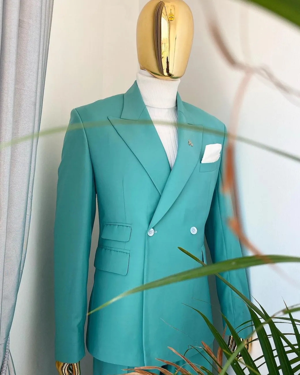 A Light Green Double Breasted Suit