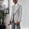 A Light grey & black floral jacquard peak lapel suit.