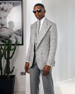 A Light grey & black floral jacquard peak lapel suit.