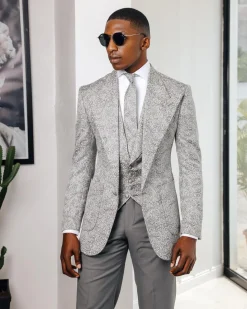 A Light grey & black floral jacquard peak lapel suit.