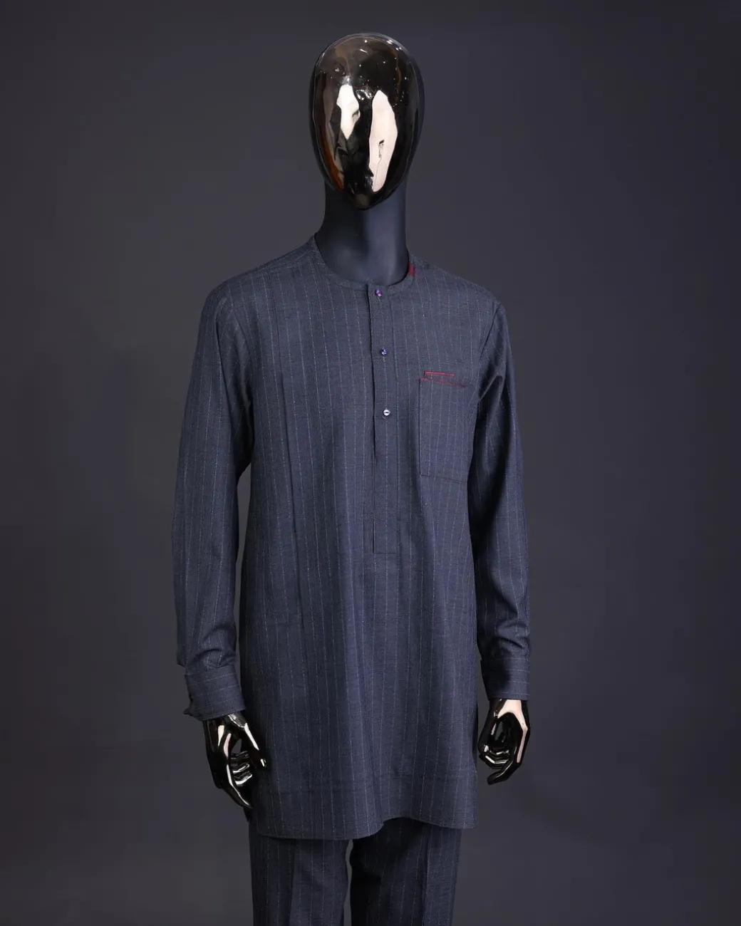A Light grey and blue stripe Jorgecarli fabric with blue Swarovski button long-sleeve kaftan and Sokoto