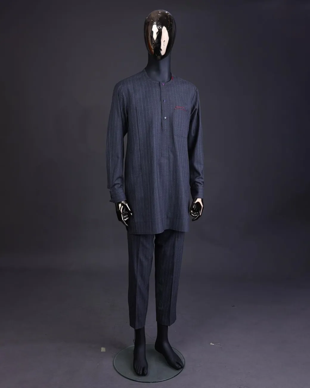 A Light grey and blue stripe Jorgecarli fabric with blue Swarovski button long-sleeve kaftan and Sokoto