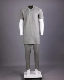 A Light grey, front flap with silver studded Swarovski buttons, left drop Arewa embroidery, short sleeve African senator kaftan native