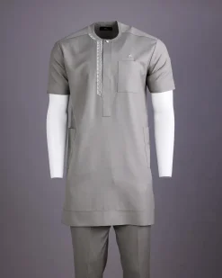 A Light grey, front flap with silver studded Swarovski buttons, left drop Arewa embroidery, short sleeve African senator kaftan native