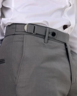 A light grey, Gurkha pant with back and side metal adjuster.