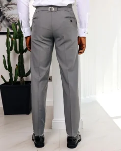 A light grey, Gurkha pant with back and side metal adjuster.