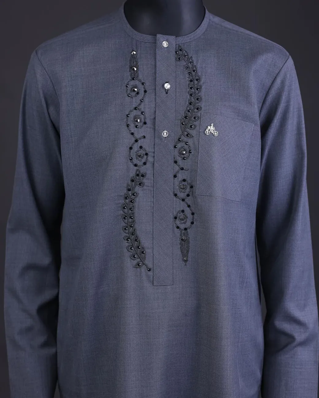 A Light grey, patterned floral embroidery details with black Swarovski stone details, silver button, long sleeve kaftan and Sokoto