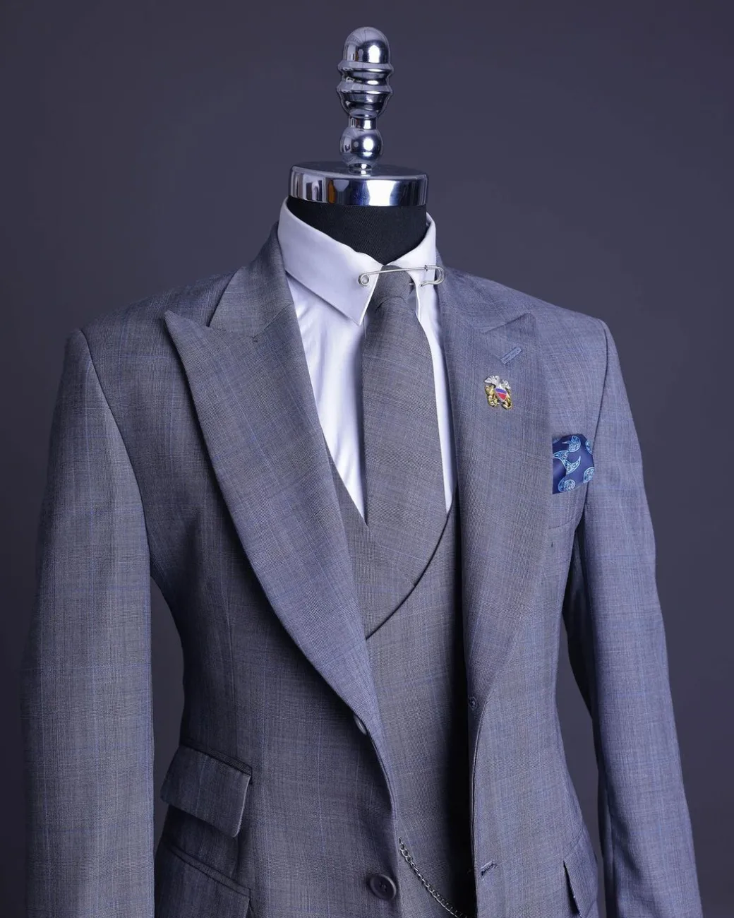 A light grey, windowpane check, monochrome nobility super “140s” “Board Room” Notch lapel suit