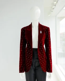 A Lipstick Red, Soaked Velvet Peak Lapel Suit.
