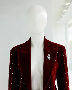 A Lipstick Red, Soaked Velvet Peak Lapel Suit.