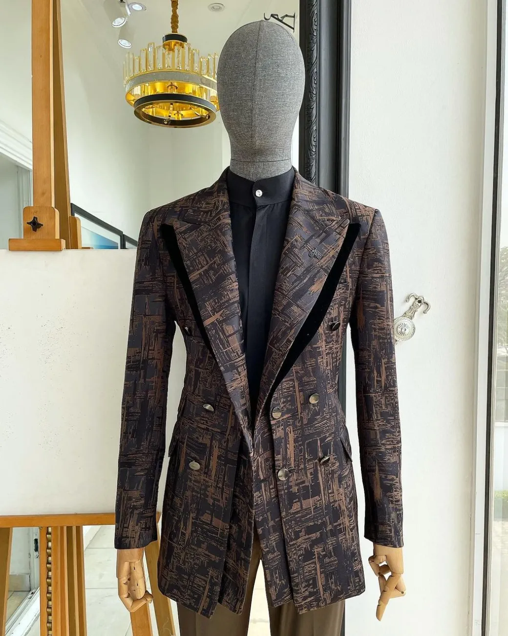 A “Made In Lagos”, Quad peak lapel, triple breasted metallic jacquard blazer suit