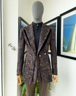 A “Made In Lagos”, Quad peak lapel, triple breasted metallic jacquard blazer suit