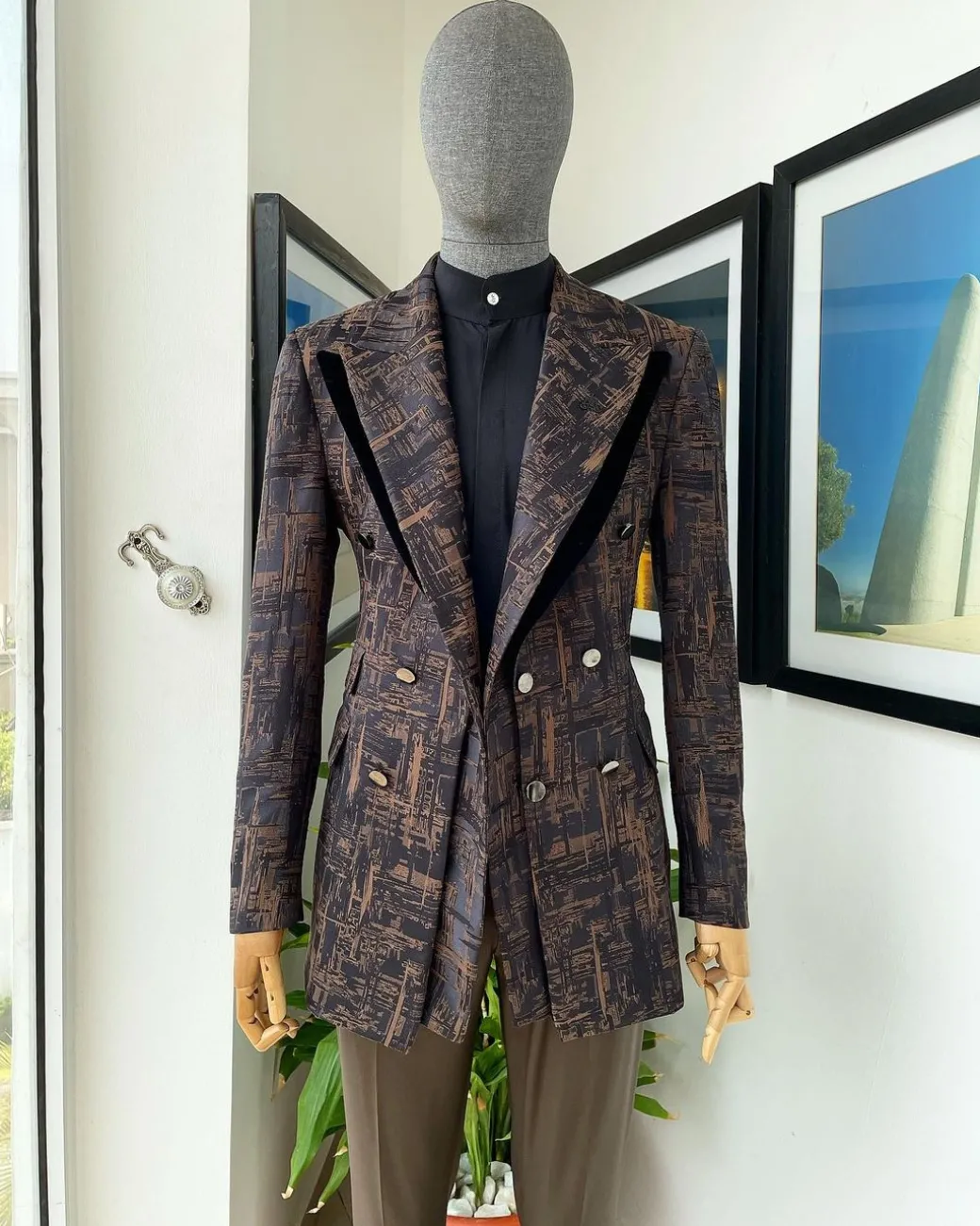 A “Made In Lagos”, Quad peak lapel, triple breasted metallic jacquard blazer suit