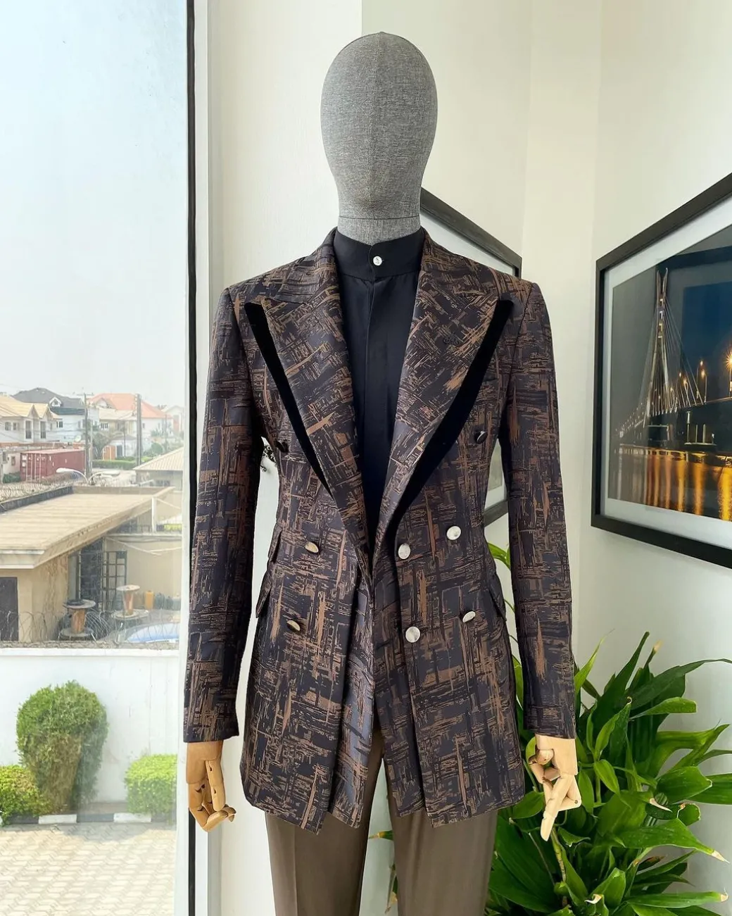 A “Made In Lagos”, Quad peak lapel, triple breasted metallic jacquard blazer suit