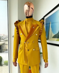 A “Made in Lagos” Wing Flare, Quad peak lapel, triple breasted metallic jacquard blazer suit