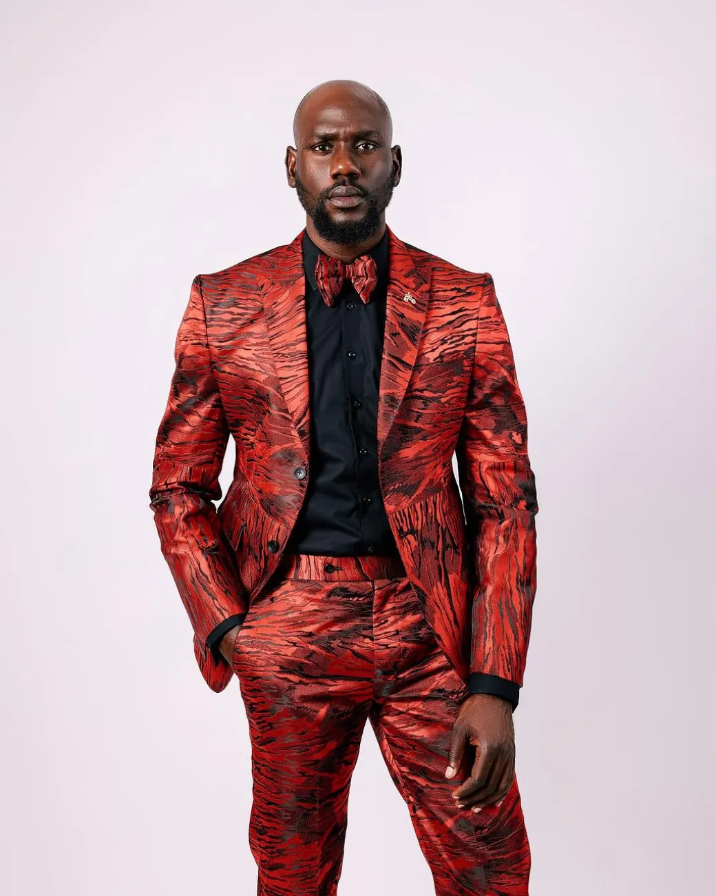 A Mahogany Red “Black Tears” Inverted Pattern Peak Lapel Jacquard Suit