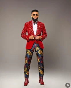 A Mahogany red shawl lapel tuxedo with black and octagonal laser-cut matching Swarovski stones suit