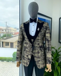 A “Mandarin” Dispersed Black and Gold Peak Lapel Suit