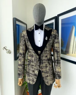 A “Mandarin” Dispersed Black and Gold Peak Lapel Suit