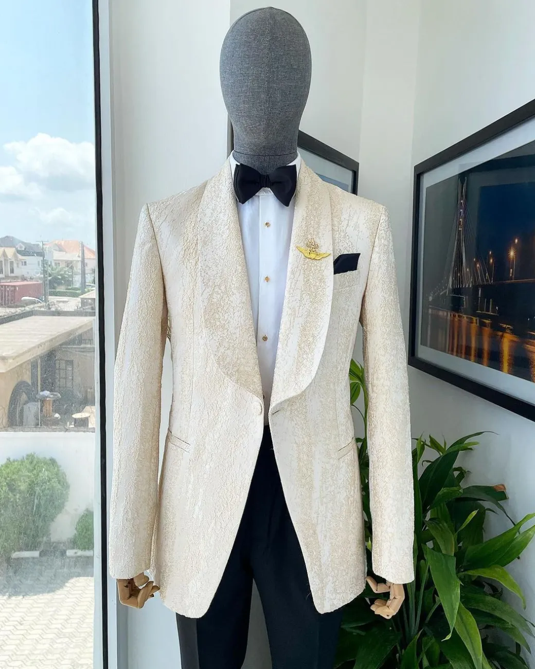 A “Mandarin” dispersed gold abd ivory ruffle pattern shawl lapel jacquard suit