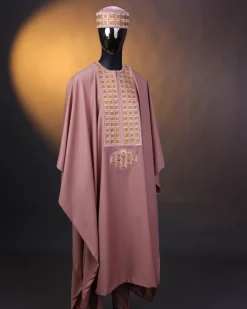 A Mauve, connected square embroidery design with matching gold Swarovski stone details agbada
