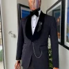 A Metallic coarse and floral pattern midnight blue jacquard tuxedo Suit.