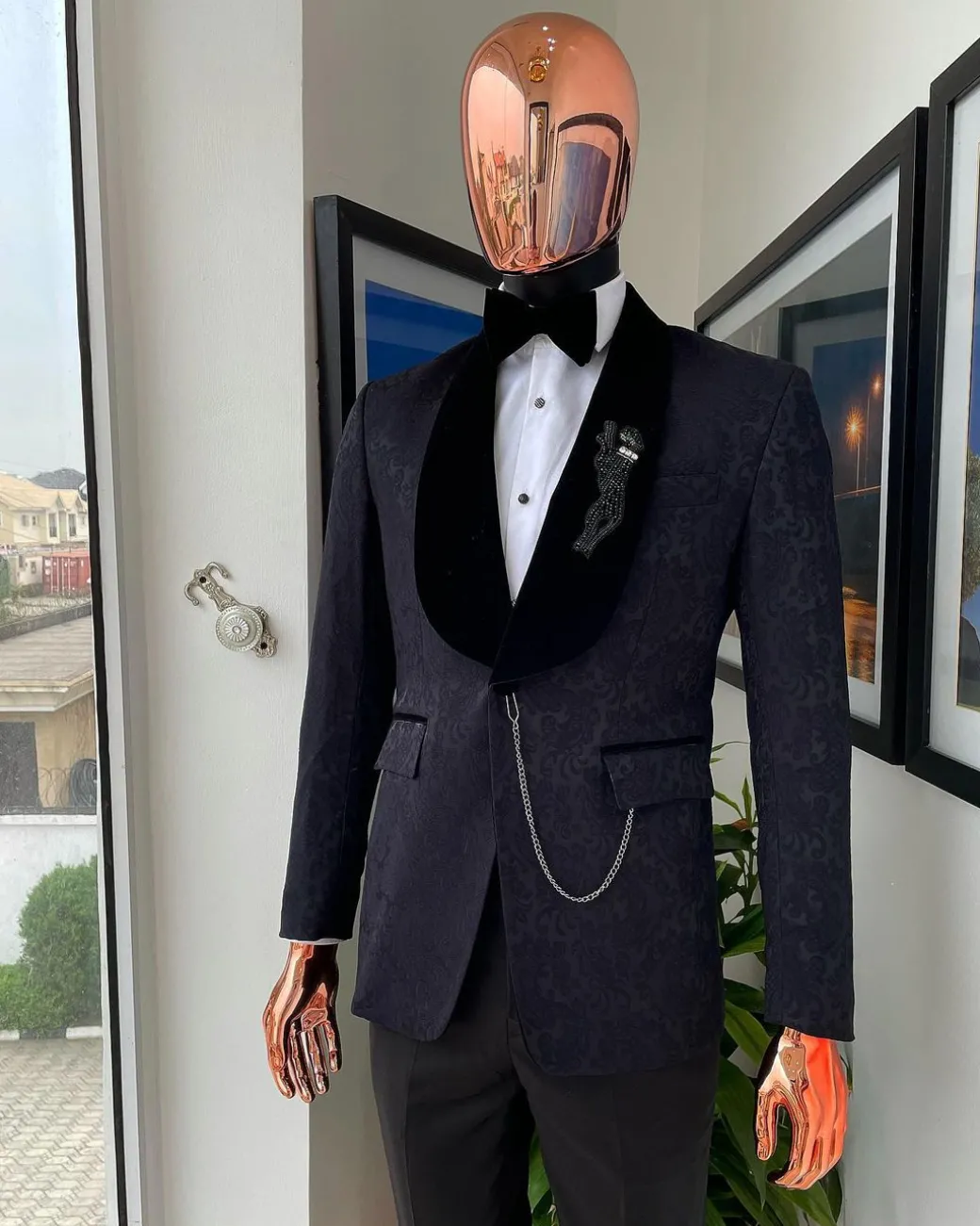 A Metallic coarse and floral pattern midnight blue jacquard tuxedo Suit.
