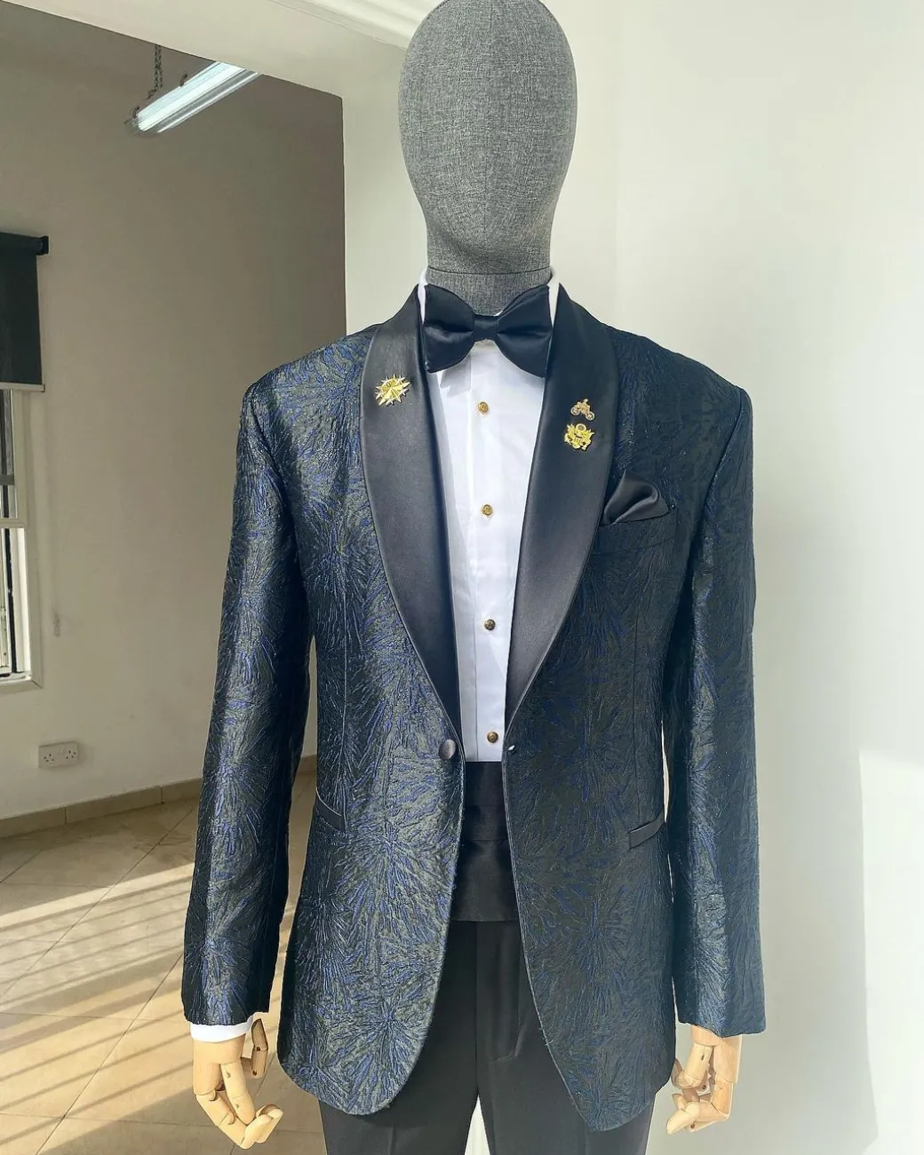 A Metallic Midnight blue and black broom pattern jacquard shawl lapel tuxedo suit