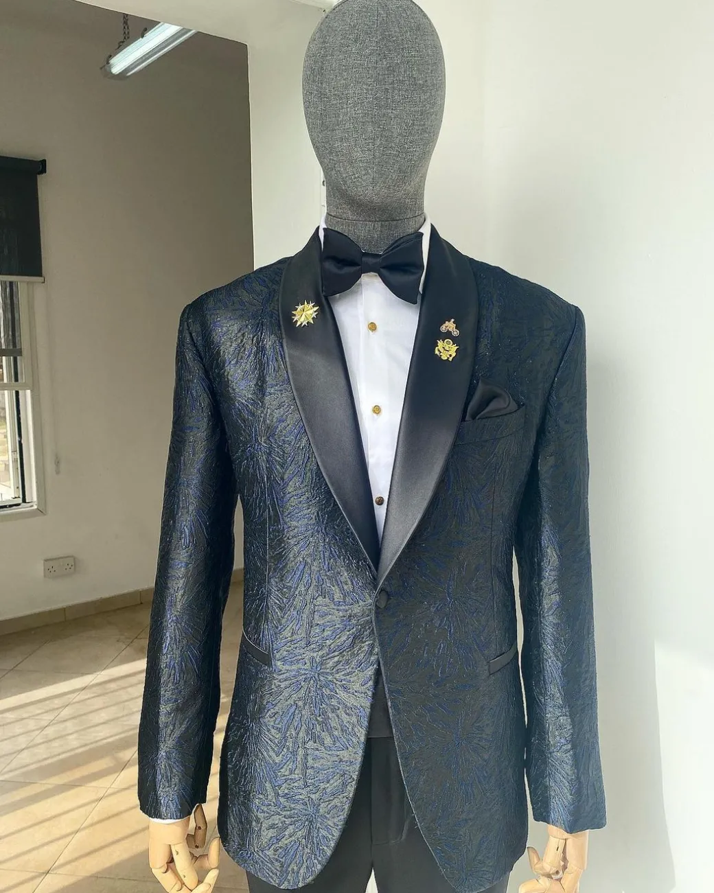 A Metallic Midnight blue and black broom pattern jacquard shawl lapel tuxedo suit