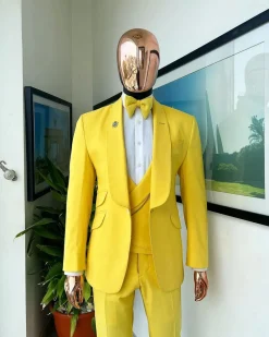 A Middle yellow linen shawl lapel jacket, cross cut unbalanced wrapped waistcoat, bow tie & Gurkha pant Trouser