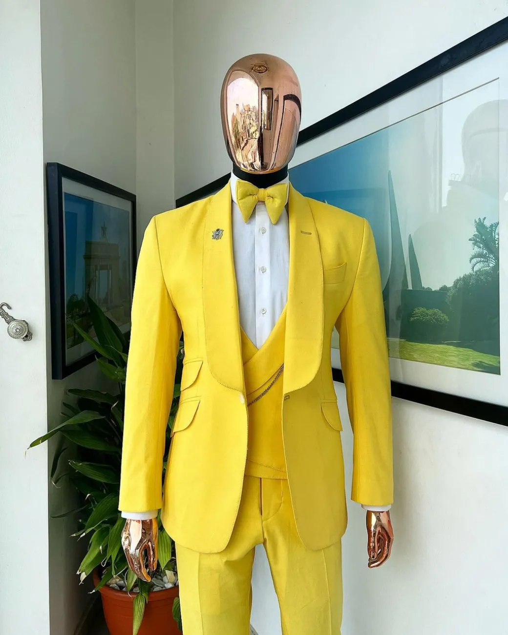 A Middle yellow linen shawl lapel jacket, cross cut unbalanced wrapped waistcoat, bow tie & Gurkha pant Trouser