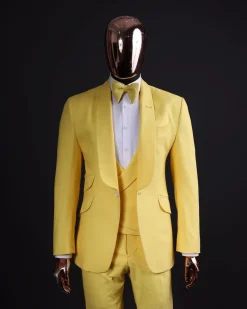 A Middle yellow linen shawl lapel jacket, cross cut unbalanced wrapped waistcoat, bow tie & Gurkha pant Trouser