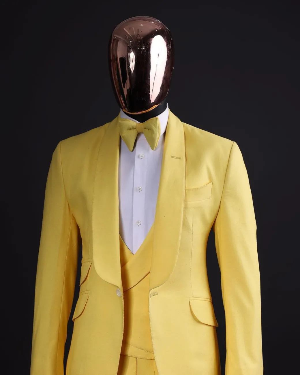 A Middle yellow linen shawl lapel jacket, cross cut unbalanced wrapped waistcoat, bow tie & Gurkha pant Trouser