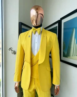 A Middle yellow linen shawl lapel jacket, cross cut unbalanced wrapped waistcoat, bow tie & Gurkha pant Trouser