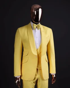 A Middle yellow linen shawl lapel jacket, cross cut unbalanced wrapped waistcoat, bow tie & Gurkha pant Trouser